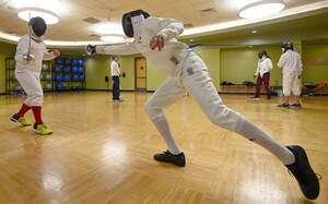 elliot and trevor fencing in class bout courtesy of Greeley Tribune