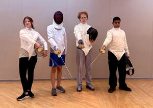 four winning fencers from tournament holding sabers downward with tip of blades together